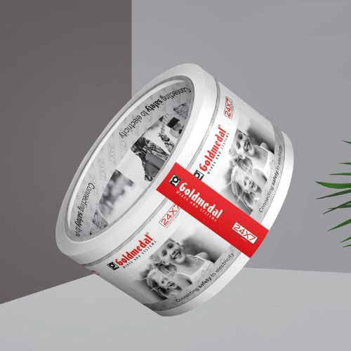 Printed label roll with silver and red panel artwork.