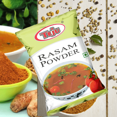 Rasam powder stand-up pouch with food-style background.